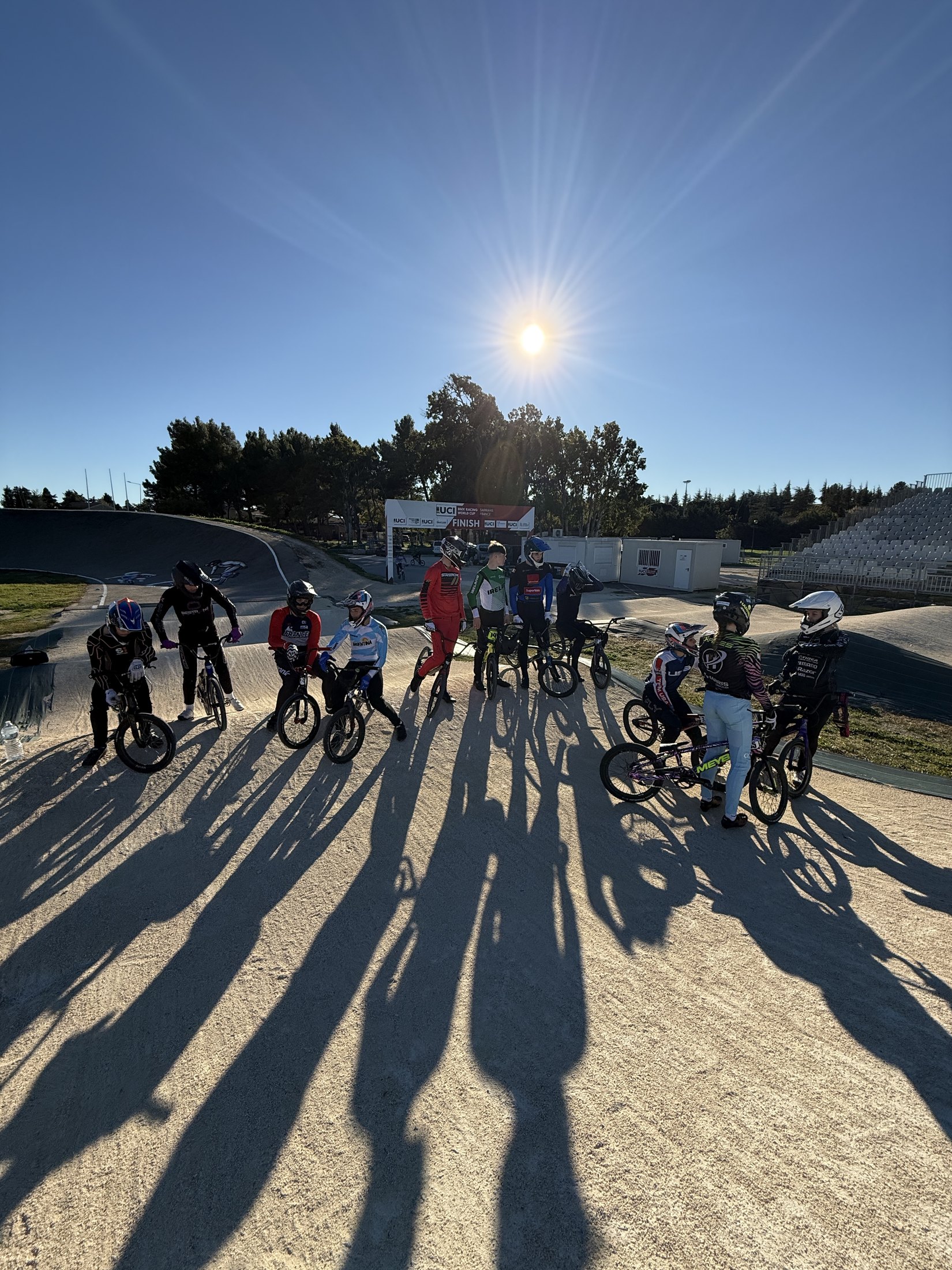 Training group on track during a BMX camp