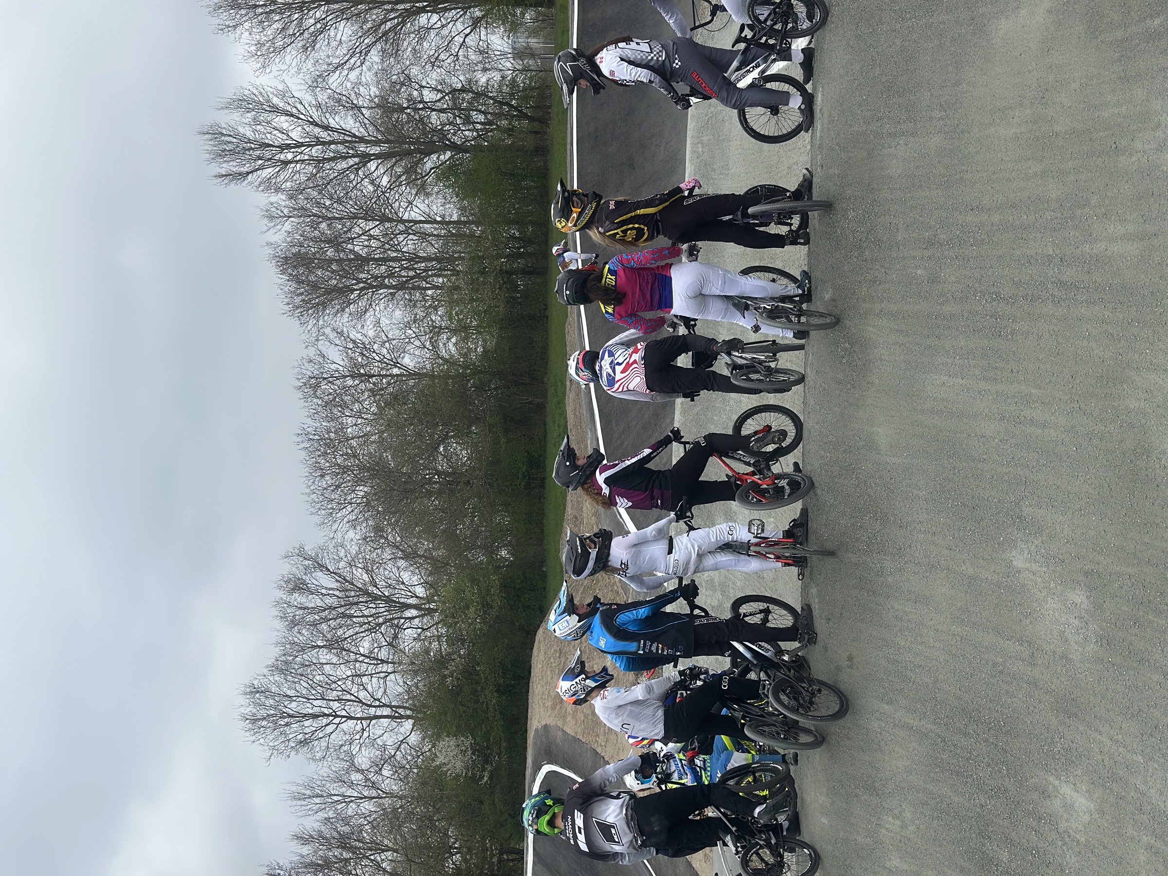 BMX riders gathered on track during a camp
