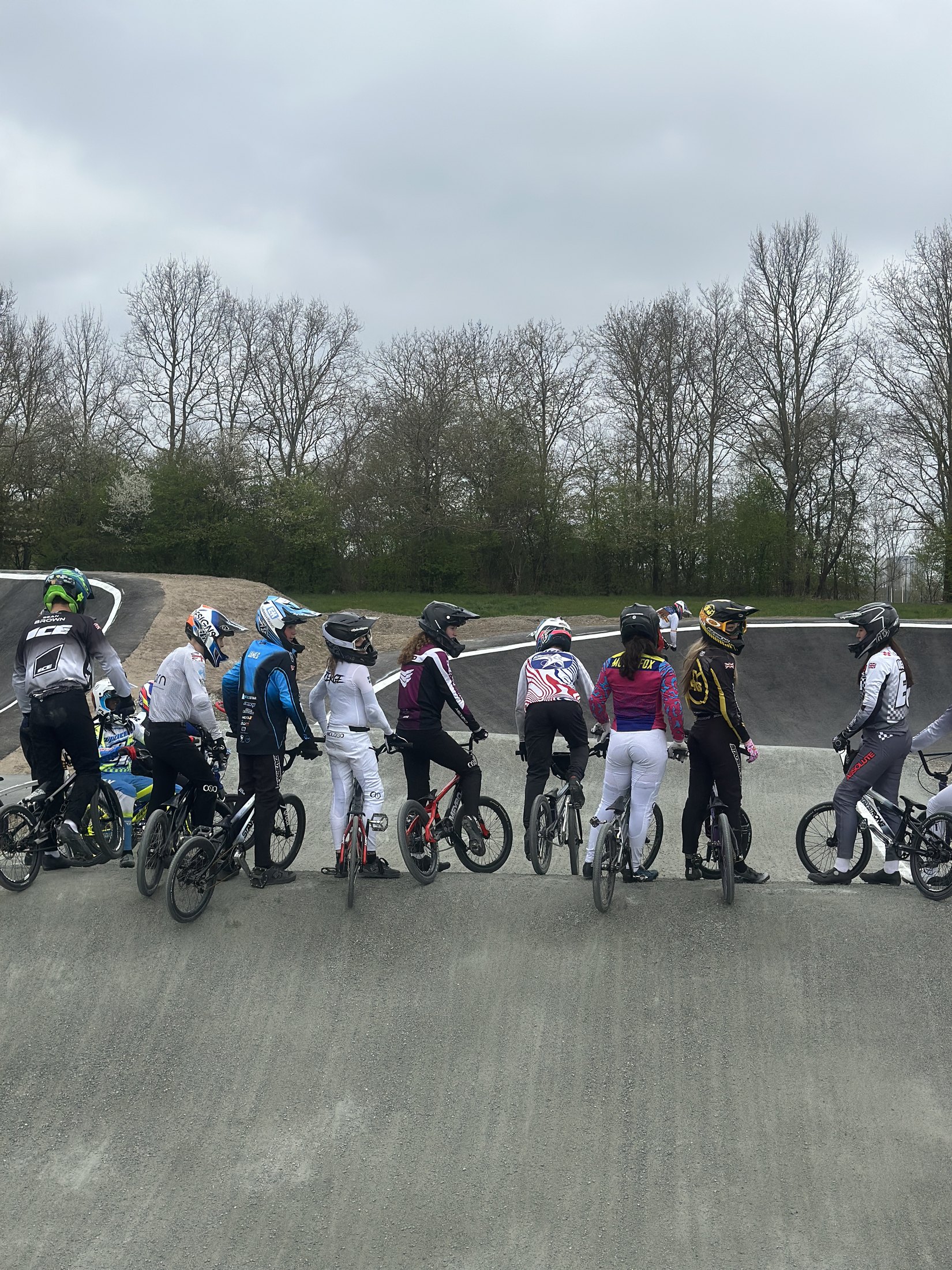 BMX riders gathered on track during a camp