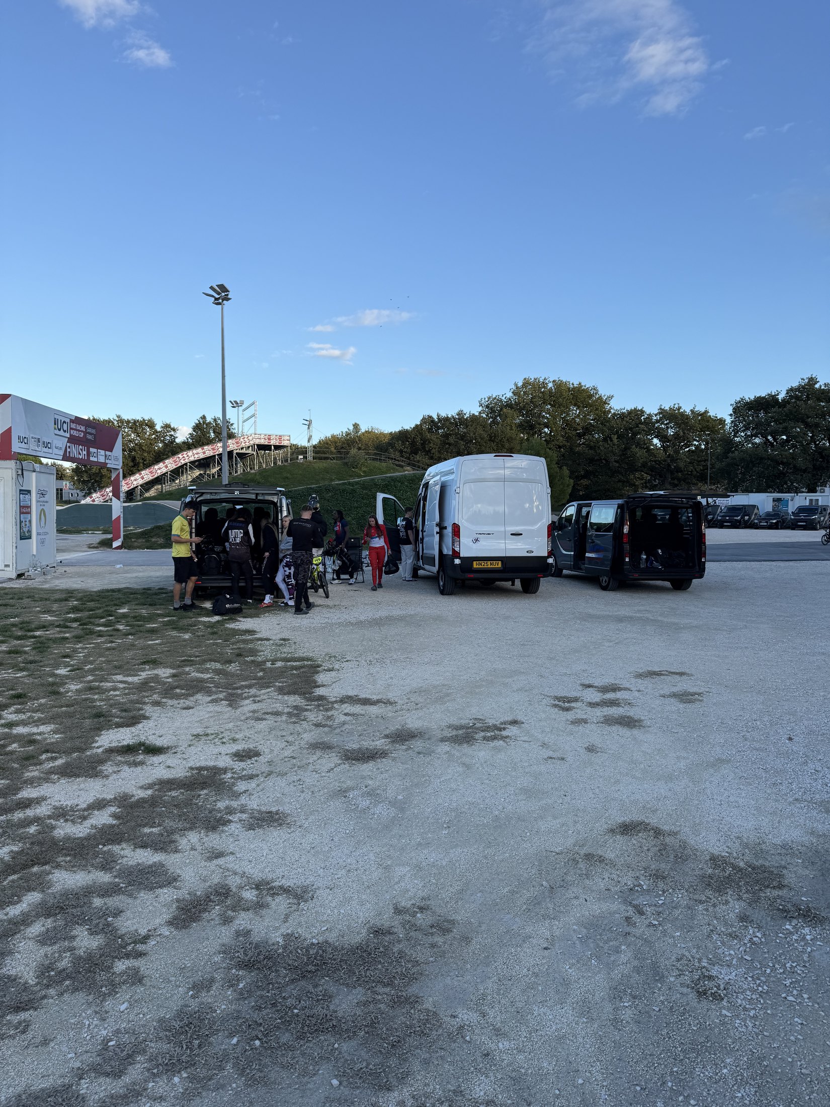Camp riders and support vehicles at Sarrians