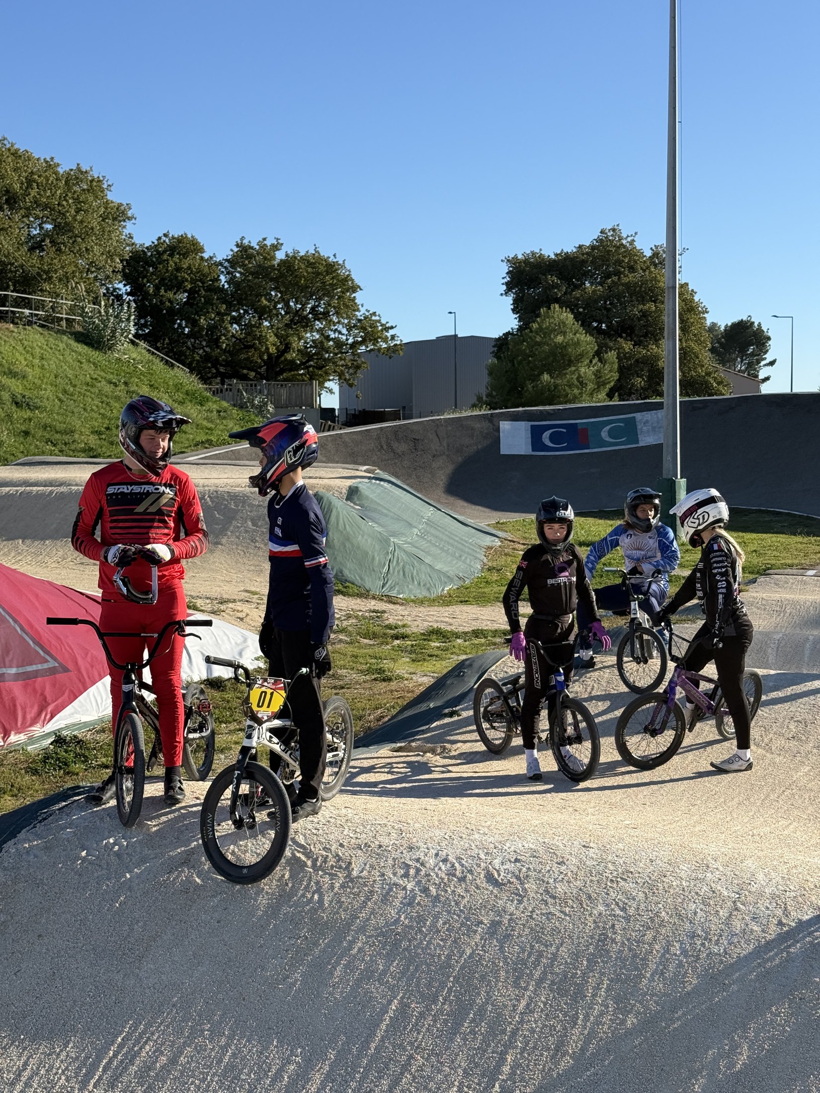 Small group training together on a BMX track